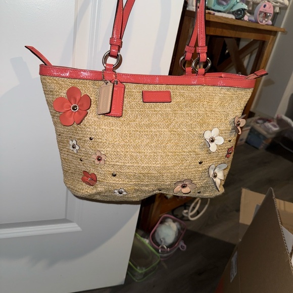 Coach Handbags - Coach Natural Straw Tote with pink and white leather Floral Accents